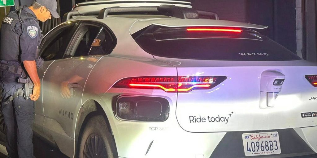 When a Driverless Car Makes an Illegal U-Turn, Who Gets the Ticket?