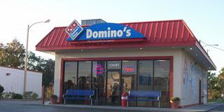 Domino's Pizza, vendite in aumento ma utili in calo nel terzo trimestre