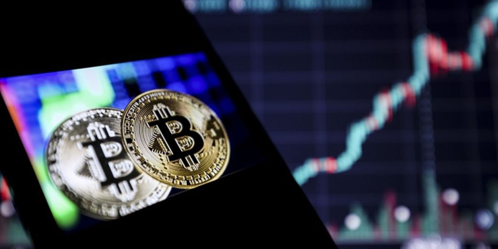 Crollo del Valore di Bitcoin: la Decisione della Fed e l'Andamento del Mercato Tecnologico Hanno un Impatto Significativo sulla Valuta Digitale
