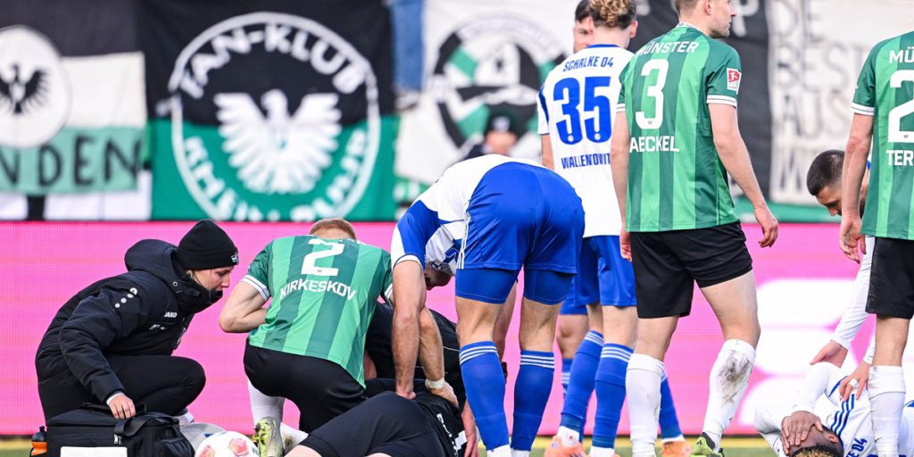 Incidente violento a Münster: l'arbitro infligge punizione severa dopo impatto tra giocatori